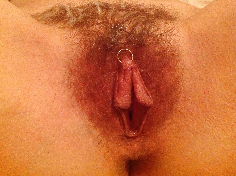 Pierced hairy pussy photo
