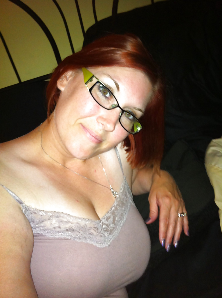 Sex Redhead mom is a lady on the street but a freak in the bed image