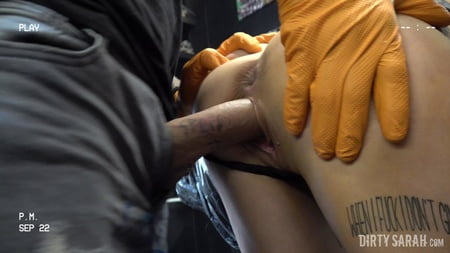 dirty sarah bitch got her forehead tattooed         