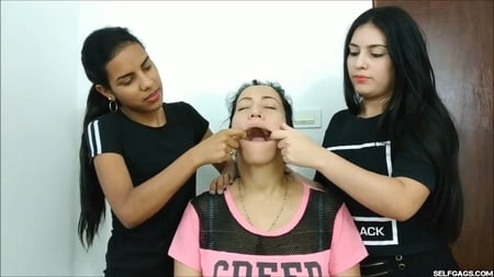 gagged woman mouth stuffed with multiple socks selfgags         