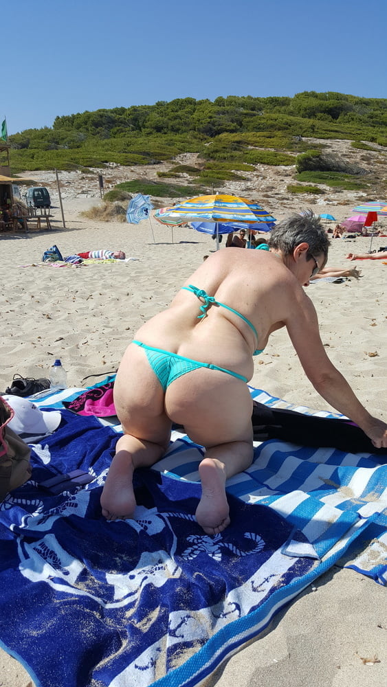 Sex uk Mature modelling her beach outfits image