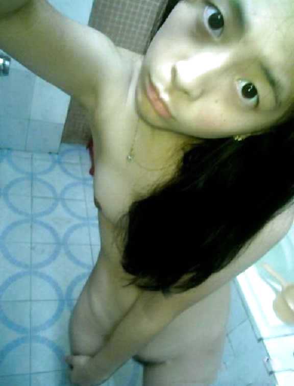 Sex CHINESE - Slutty Girl Selfshot in Bathroom Part 2 image