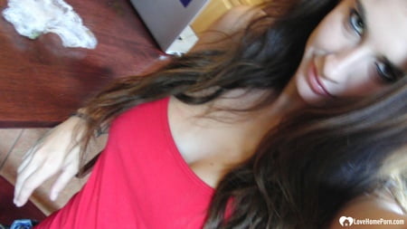 brunette cutie gets some cum over herself         