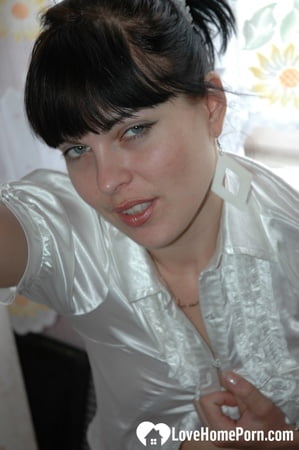 Smoking mom in stockings showing off her legs