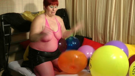 popping balloons fetish video         