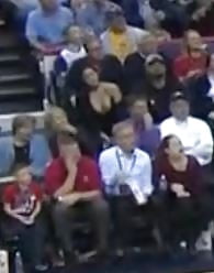 Sex Dirty Asian slut showing massive cleavage at NBA game image