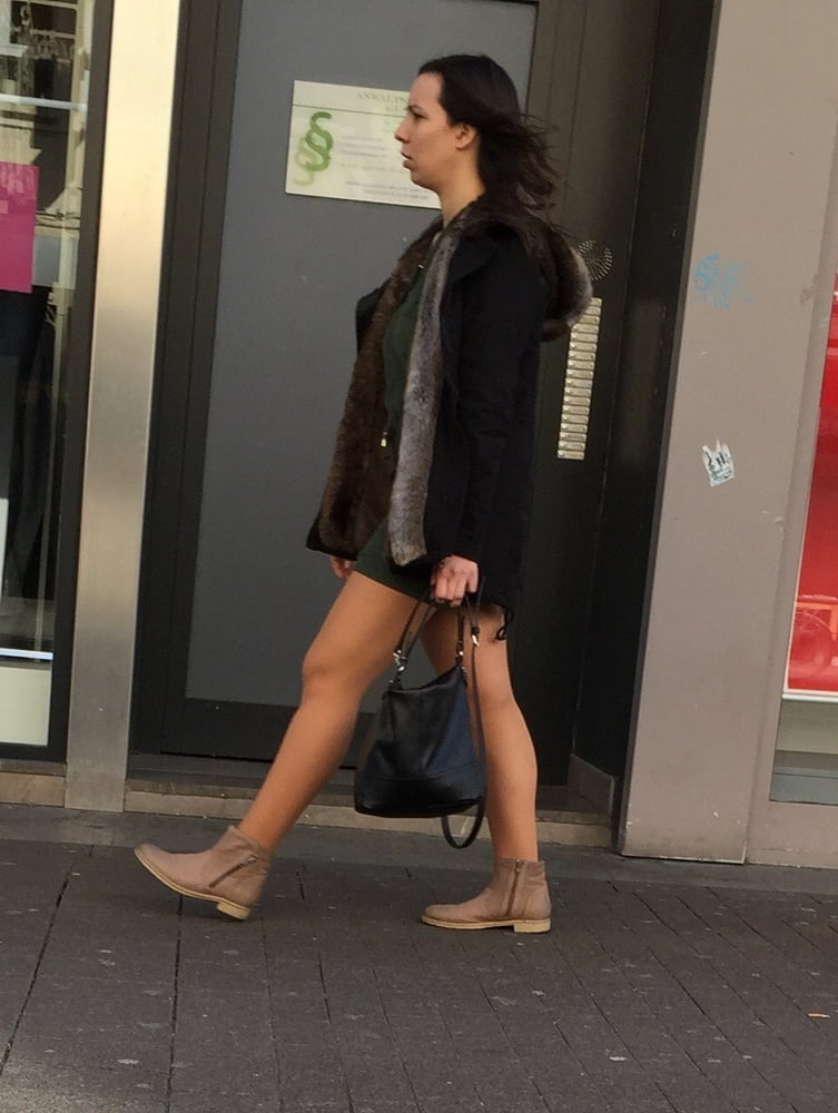 Cute lady in tan pantyhose and brown ankle boots- 24 Photos 