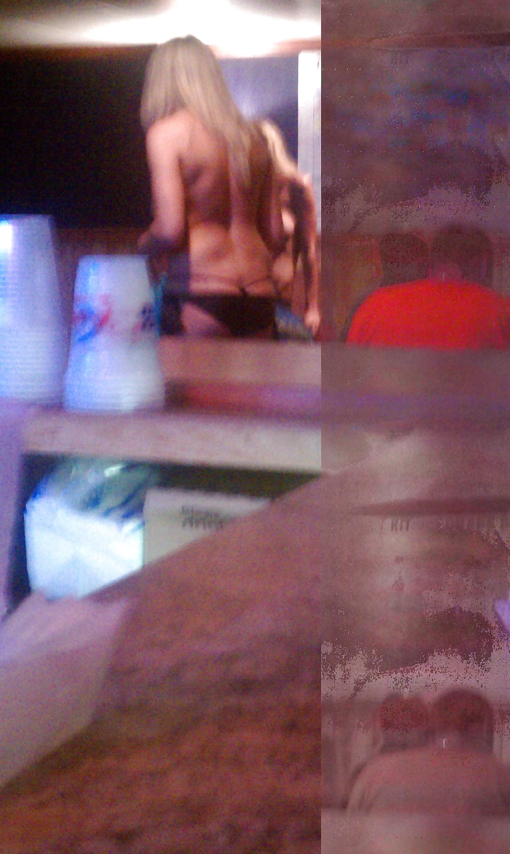 Sex stripers upstairs for a football draft party image