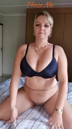 bbw milf in sheer pantyhose and panties on bed         