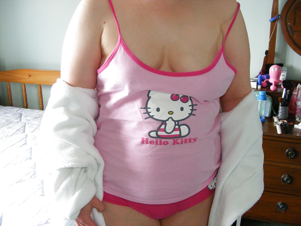 Sex Slut in pink heels, in and out of Hello Kitty pyjamas image