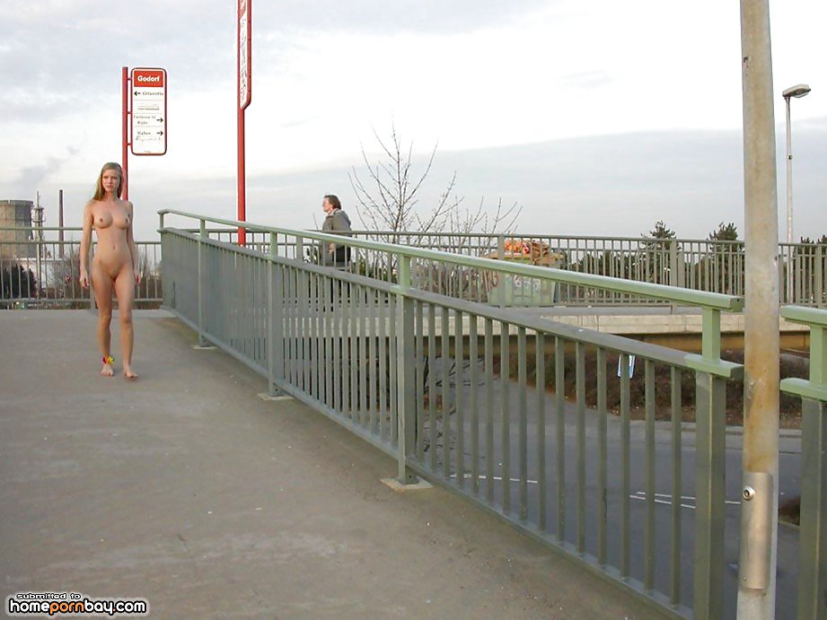 Sex Posing naked in a public place image