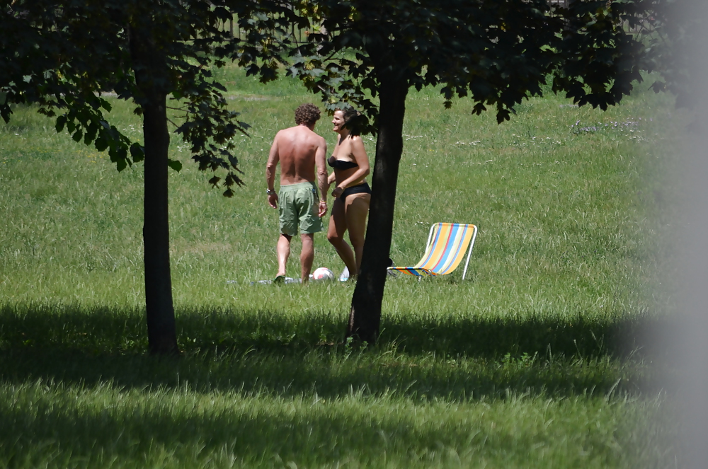 Sex girl sunbathing in the park I image