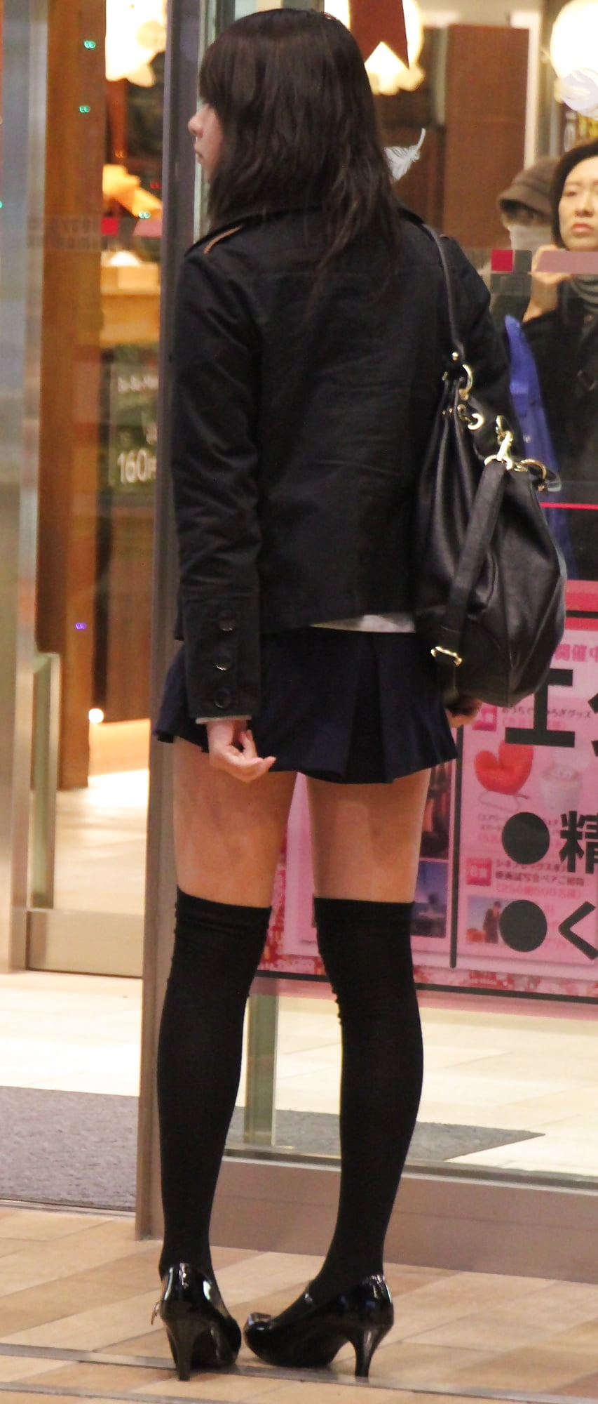 Sex Japanese teen with xtra-miniskirt and high socks image