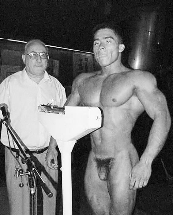 More related nude men weighing.