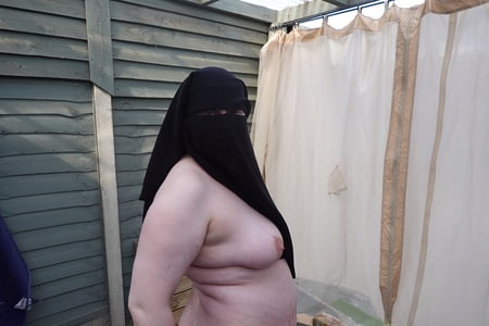 nude in niqab in ankle boots         