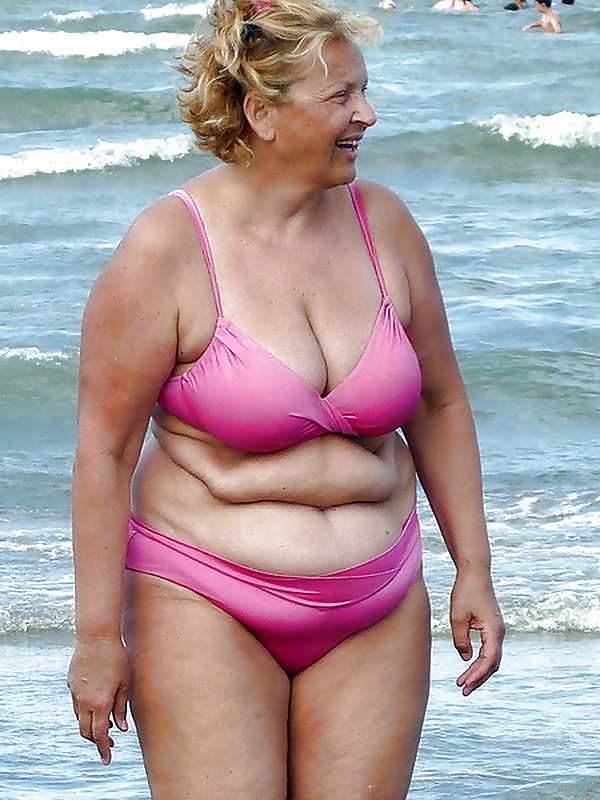 More related curvy matures in bikinis at the beach.