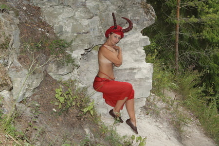 forest satyr on the rock         