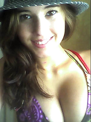 Busty teen likes a bikini selfie