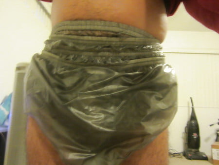 four pairs of plastic pants this morning with butt plug in