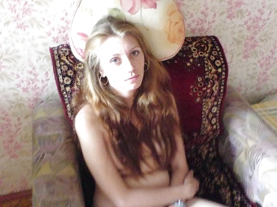 Sex Silly Russian redhead posing and sucking cock image