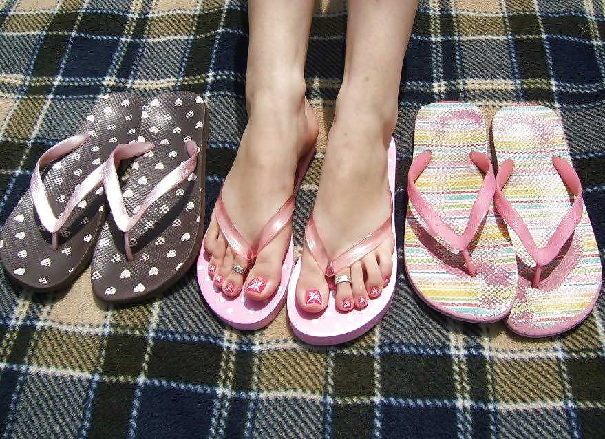 Sex Jewel Pink Feet and Flip Flops. image