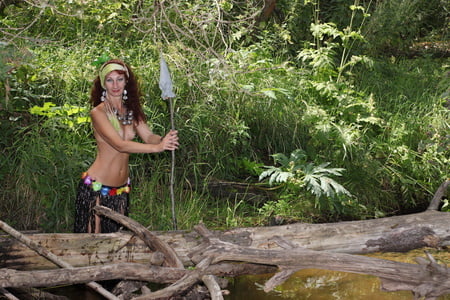 savage girl in river         