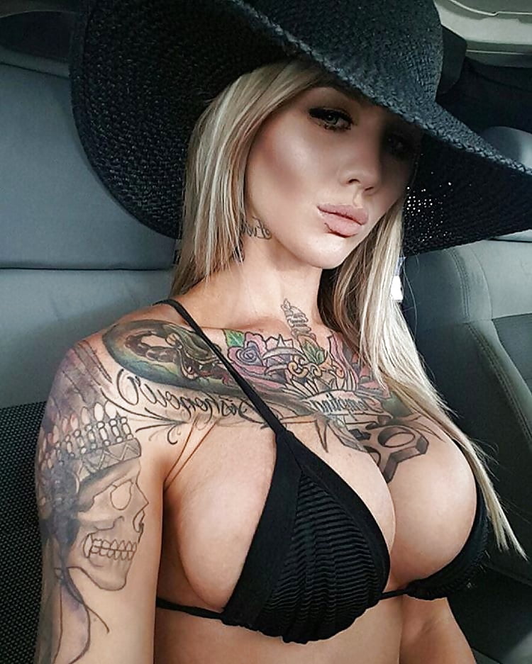 Woman With Paw Print Tattoos On Her Breasts Says She's Undateable