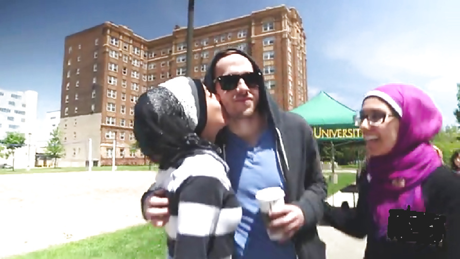 Sex Veiled Arab slut kissing white dude image
