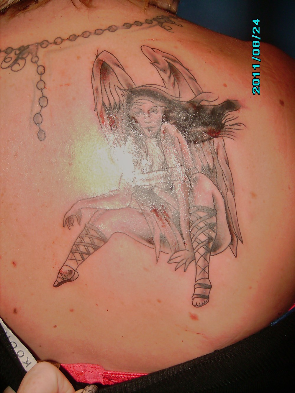 Sex naughty angel tattoo image