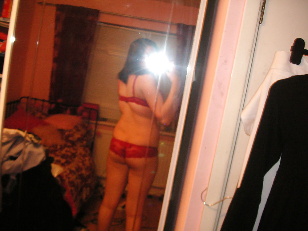 Sex teen posing on the mirror image