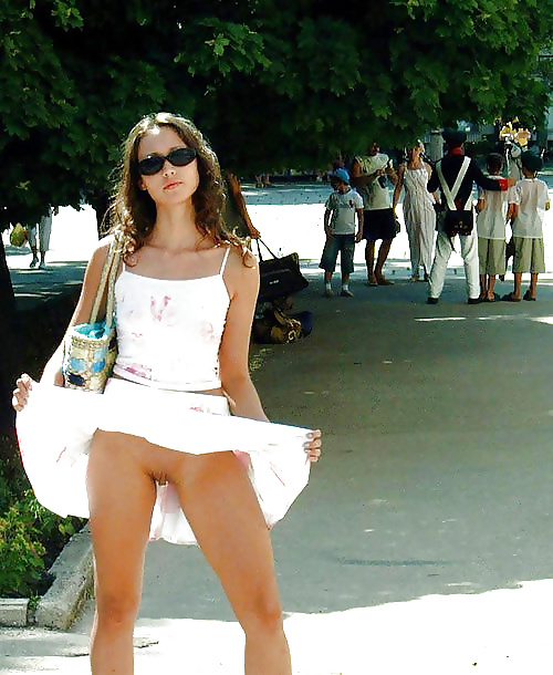 Sex Flashing Lifting Her Skirt In Public On The Street image