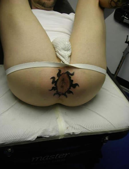 Butterfly tattoo on butt