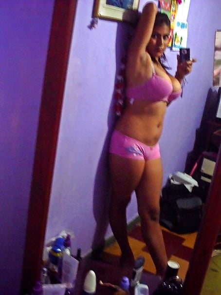 Sex Latina hot girl shows Her big tits image