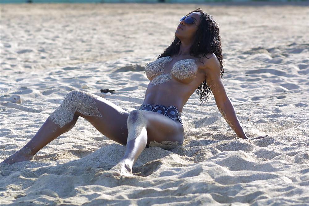 Sex BUSTY EBONY ON THE BEACH image