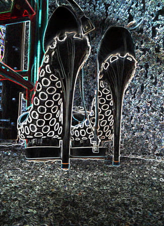 luminous contours of legs heels and ass         