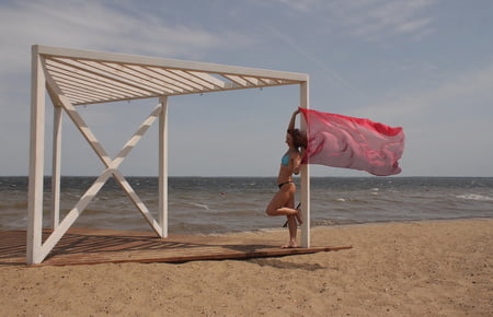 red shawl on windy weather         